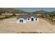 Modern home with a grey tile roof and mountain views at 3368 W Judd Rd, San Tan Valley, AZ 85144