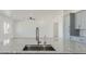 Kitchen sink and faucet detail with granite countertop at 3368 W Judd Rd, San Tan Valley, AZ 85144