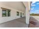 Covered patio with multiple windows and mountain views at 3368 W Judd Rd, San Tan Valley, AZ 85144