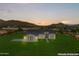 Modern home with a grey tile roof and mountain views at 3368 W Judd Rd, San Tan Valley, AZ 85144