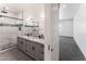 Elegant bathroom with double vanity, granite countertop, and large walk-in shower at 3368 W Judd Rd, San Tan Valley, AZ 85144