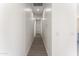 Long hallway with light gray wood-look flooring at 3368 W Judd Rd, San Tan Valley, AZ 85144