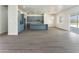 Open concept kitchen with blue cabinets and granite island at 3368 W Judd Rd, San Tan Valley, AZ 85144