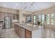 Gourmet kitchen with granite countertops and stainless steel appliances at 16401 W Monterey Way, Goodyear, AZ 85395