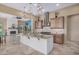 Open concept kitchen with large island and stainless steel appliances at 16401 W Monterey Way, Goodyear, AZ 85395