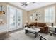 Comfortable office space with French doors and built in shelving at 16401 W Monterey Way, Goodyear, AZ 85395