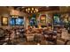Elegant clubhouse lounge with fireplace and comfortable seating at 16401 W Monterey Way, Goodyear, AZ 85395