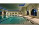 Resort-style indoor swimming pool with ample seating at 16401 W Monterey Way, Goodyear, AZ 85395
