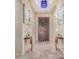 Bright and airy entryway with hardwood floors and decorative accents at 16401 W Monterey Way, Goodyear, AZ 85395