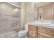 Clean bathroom with shower, toilet and vanity at 16401 W Monterey Way, Goodyear, AZ 85395