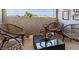 Relaxing balcony with wicker chairs and city views at 7577 W Darrow St, Laveen, AZ 85339