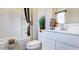 Clean bathroom with white vanity and bathtub at 7577 W Darrow St, Laveen, AZ 85339