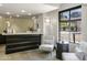 Elegant lobby with comfortable seating and large windows at 15802 N 71St St # 307, Scottsdale, AZ 85254