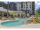 Resort-style pool with a spa and comfortable lounge area at 15802 N 71St St # 307, Scottsdale, AZ 85254