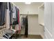 Large walk-in closet with ample hanging and shelving space at 15802 N 71St St # 307, Scottsdale, AZ 85254