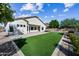 Spacious backyard with artificial turf and hot tub at 5525 E Dusty Wren Dr, Cave Creek, AZ 85331