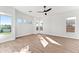 Spacious bedroom with hardwood floors and large windows offering natural light at 5525 E Dusty Wren Dr, Cave Creek, AZ 85331