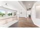 Open living area with hardwood floors and views to backyard at 5525 E Dusty Wren Dr, Cave Creek, AZ 85331