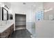 Spa-like bathroom featuring double sinks, walk-in shower, and large closet at 5525 E Dusty Wren Dr, Cave Creek, AZ 85331