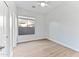 Bright bedroom with large window and ceiling fan at 5525 E Dusty Wren Dr, Cave Creek, AZ 85331