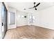 Bedroom with hardwood floors and sliding glass doors to backyard access at 5525 E Dusty Wren Dr, Cave Creek, AZ 85331