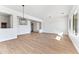 Elegant dining room with hardwood floors and modern light fixture at 5525 E Dusty Wren Dr, Cave Creek, AZ 85331