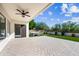 Covered patio with ceiling fan, adjacent to the hot tub at 5525 E Dusty Wren Dr, Cave Creek, AZ 85331