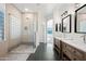Elegant bathroom with double vanity, large shower, and modern fixtures at 5525 E Dusty Wren Dr, Cave Creek, AZ 85331
