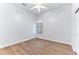 Bright bedroom with wood-look tile flooring and ceiling fan at 5525 E Dusty Wren Dr, Cave Creek, AZ 85331
