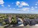 Aerial view showcasing the house and surrounding neighborhood at 5525 E Dusty Wren Dr, Cave Creek, AZ 85331