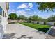 Artificial turf and patio with hot tub in backyard at 5525 E Dusty Wren Dr, Cave Creek, AZ 85331