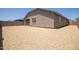 Large backyard with gravel and block wall at 17821 W Villa Hermosa Ln, Surprise, AZ 85387