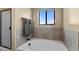 Bathroom with garden tub and shower, offering natural light at 48940 W Long Rifle Rd, Aguila, AZ 85320