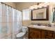 Small bathroom with shower and single vanity at 48940 W Long Rifle Rd, Aguila, AZ 85320