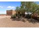 House exterior showcasing stucco siding and a spacious yard at 48940 W Long Rifle Rd, Aguila, AZ 85320