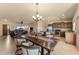 Open concept dining area with kitchen and living room views at 48940 W Long Rifle Rd, Aguila, AZ 85320