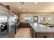 Modern kitchen with stainless steel appliances and granite countertops at 48940 W Long Rifle Rd, Aguila, AZ 85320