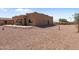 Backyard of a ranch style home at 48940 W Long Rifle Rd, Aguila, AZ 85320