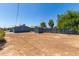 Backyard with shed and wooden fence at 113 S 92Nd Ave, Tolleson, AZ 85353