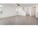 Bright living room with tile floors and neutral colors at 19778 W Monroe St, Buckeye, AZ 85326