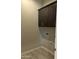 Laundry room with upper cabinets and built-in sink at 15963 W Montana De Oro Dr, Surprise, AZ 85387