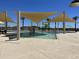 Community splash pad with shade structures at 15963 W Montana De Oro Dr, Surprise, AZ 85387