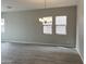 Spacious dining room with tile floors and chandelier at 15963 W Montana De Oro Dr, Surprise, AZ 85387