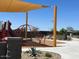 Modern playground with shade structures and climbing equipment at 15963 W Montana De Oro Dr, Surprise, AZ 85387