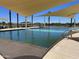 Relaxing community pool with shade structures at 15963 W Montana De Oro Dr, Surprise, AZ 85387