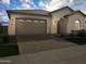 One story home with a two car garage at 15963 W Montana De Oro Dr, Surprise, AZ 85387
