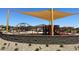 Community playground with shade structures at 15963 W Montana De Oro Dr, Surprise, AZ 85387