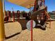playground with slides, climbing structures, and shade structures at 15963 W Montana De Oro Dr, Surprise, AZ 85387