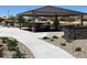 Community picnic pavilion with seating at 15963 W Montana De Oro Dr, Surprise, AZ 85387