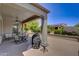 Outdoor patio with seating area and grill, perfect for entertaining at 17780 W Canto Bonito Ln, Surprise, AZ 85387
